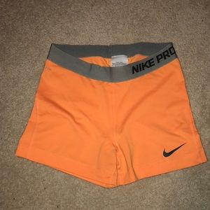 Bright Orange Nike Pro Shorts with Grey Waistband